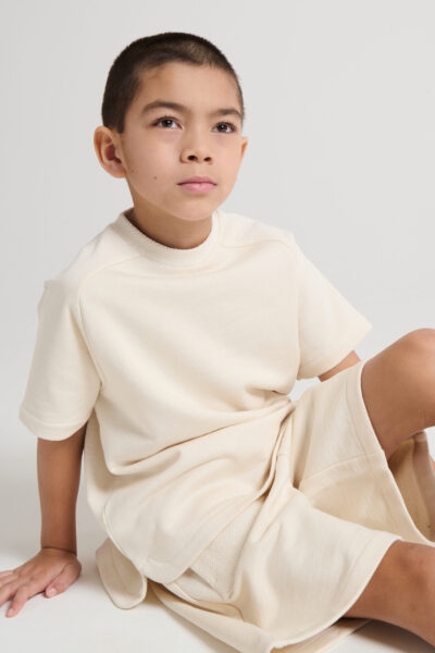 Okaïdi dévoile <i>Undyed</i>, une collection sans teinture et sans <i>blanchiment</i> - Doolittle